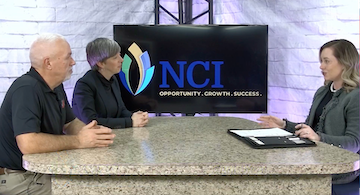 Curtis West and Stephanie Hoer sit across the interview desk from host of What's Happening at NCI (A tv monitor is between them with the NCI logo)